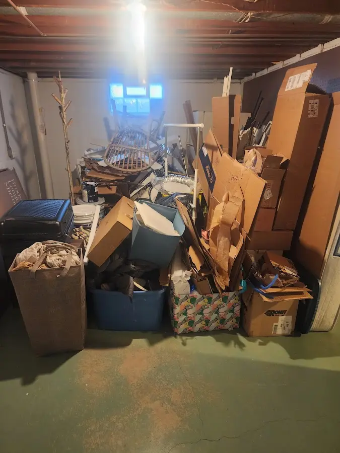 Roll-off dumpster container at job site for 4 Yard Dumpster Rental in Hoschton